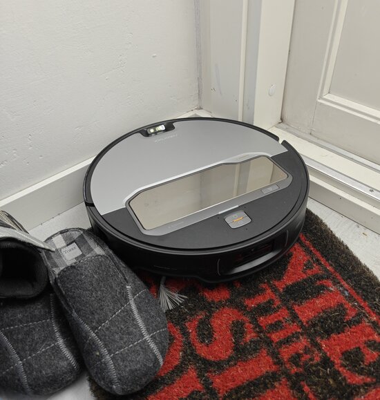 Robot stuck in corner, shoes blocking path