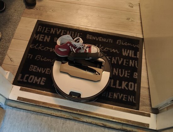 Sneaker under robot vacuum