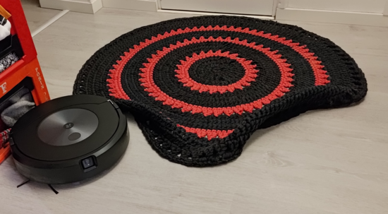 Roomba has crushed the rug and cannot move forward