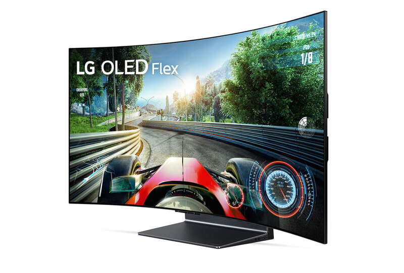 Kaareva LG OLED Flex televisio jonka näytöllä on pelikuvaa ajopelistä