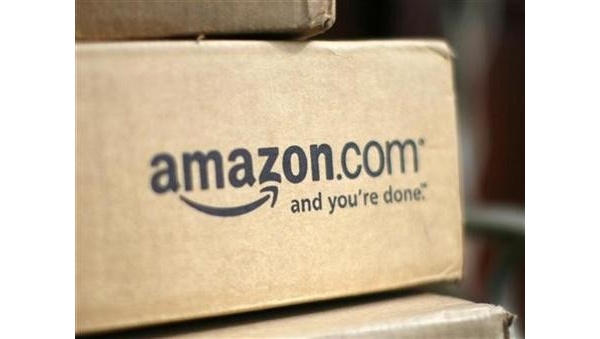 Amazon posts another quarterly loss but sales continue strong growth