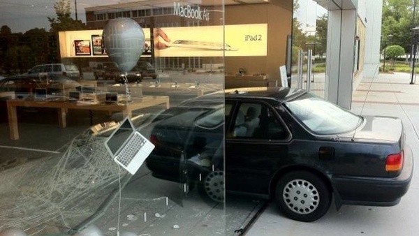 'Ninja' smashes car through Apple Store, escapes