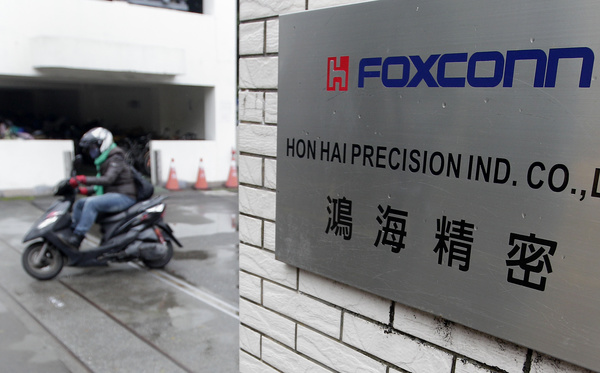 Foxconn agrees to buy Sharp for $4 billion