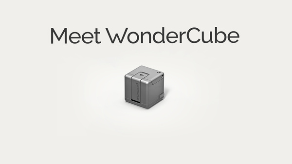 The WonderCube adds external storage, flashlight, stand, phone charger and more into a tiny 1 inch cube